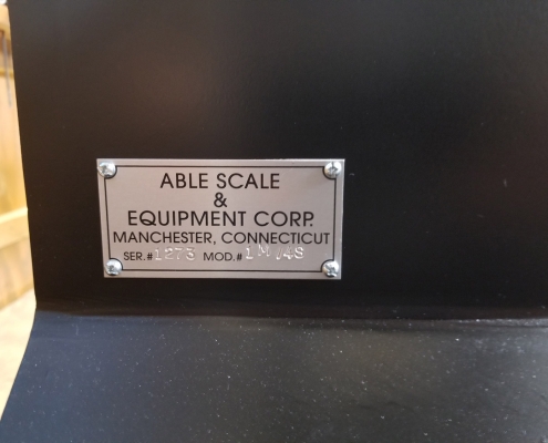 Able Scale & Equipment seal bolted onto the AMI moment tester